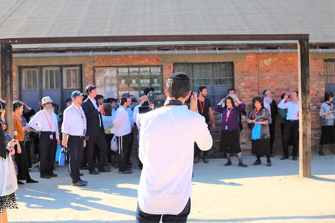 Auschwitz Birkenau: Live-Guided Tour with Transportation and Hotel Pickup - Krakow Pickup to Auschwitz: 70 km, Minivans, and Real-Time Timing