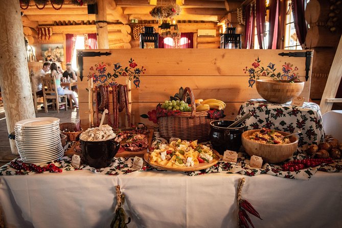 Cottage Style Evening with Folk Show and Traditional Feast from Krakow - Arrival at Kryspinów: Rustic Polish Cottage Décor Meets a Lakeside View