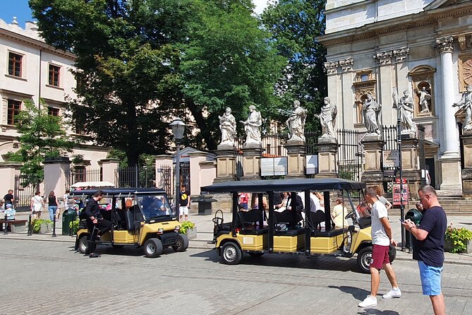 Cracow guided Full tour by Golf Cart-Family Discount - Schindler’s Factory Exterior Stops and the Empty Chairs Memorial Square