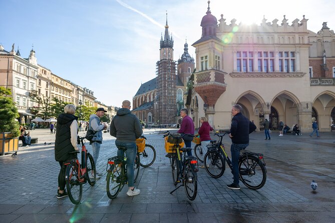 Discover Kraków by Bike with a Dutch guide - Rynek Główny, Cloth Hall views, and the legends tied to trade
