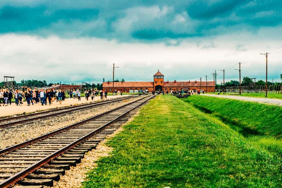 From Krakow: Auschwitz-Birkenau & Schindler's Factory Tour - Auschwitz-Birkenau with official guidance and built-in audio