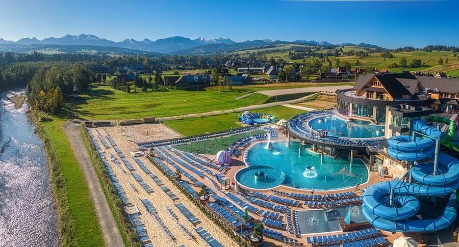 From Krakow: Zakopane Tour with Thermal Spa & Hotel Pickup - Zakopane free time: a ski-town mix of history, stalls, and lunch choices