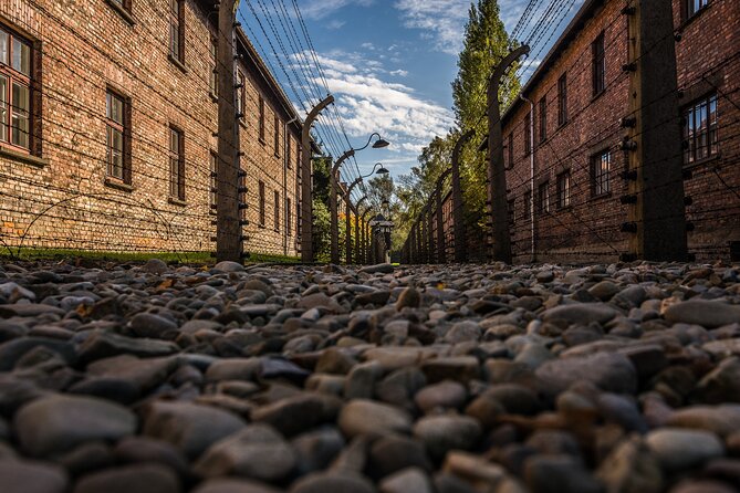 Guided Tour Krakow to Auschwitz-Birkenau with pickup options - Auschwitz I: the guided walkthrough you want, including headsets