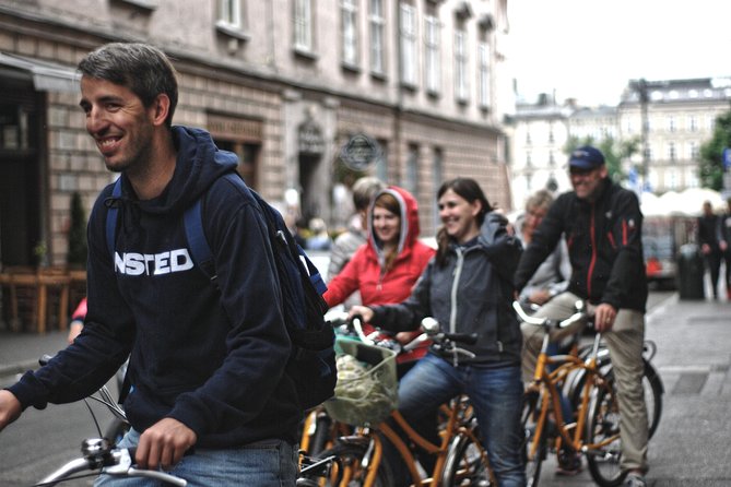 Highlights of Krakow Bike Tour - Small group - Rynek Główny and Planty Gardens, the start of the story
