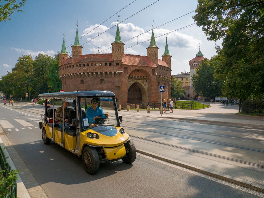 Krakow: E-Car City Tour - Heated comfort, small group pace, and multilingual audio
