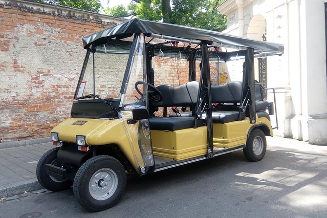 Krakow: Guided Sightseeing Tour by golf cart/buggy - Getting picked up and riding in a private group