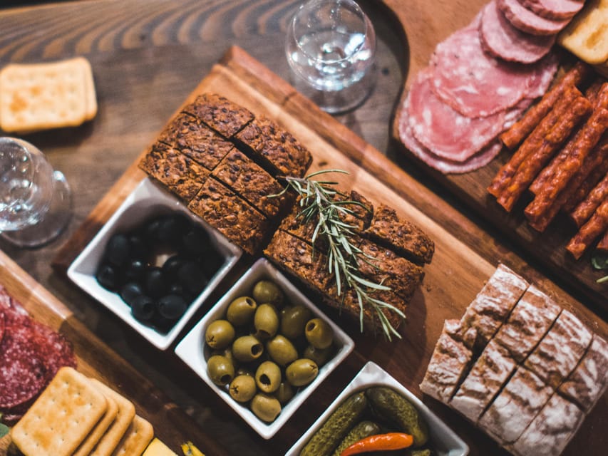 Kraków: Guided Vodka Tour with Food and Drink Tastings - Stop 1: Polish tapas, cheeses, and the vodka crash course