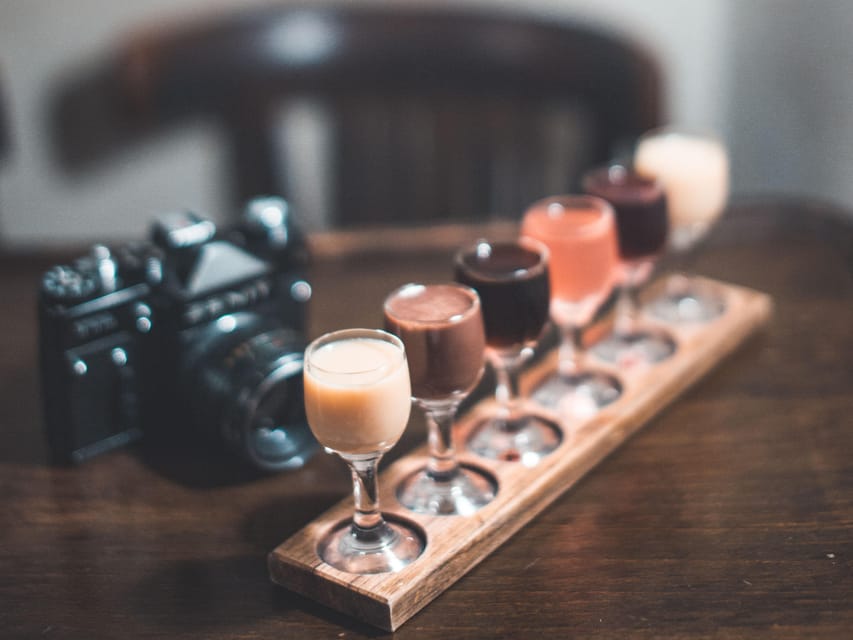 Kraków: Guided Vodka Tour with Food and Drink Tastings - Flavored vodka stops with 200+ varieties, plus how to choose