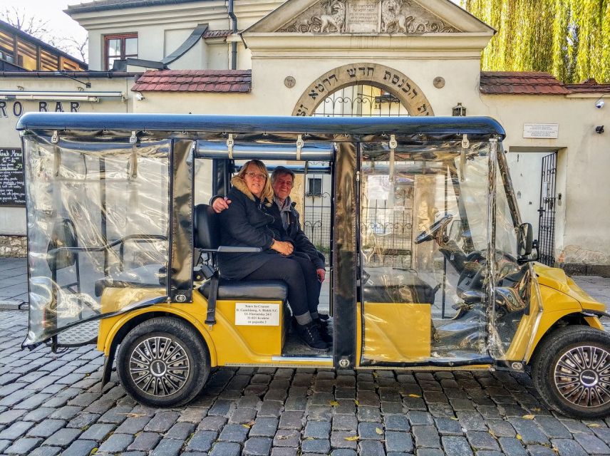 Krakow: Jewish Quarter and Ghetto Sightseeing Golf Cart Tour - WWII ghetto traces: wall fragment, homes, and Ghetto Heroes Square