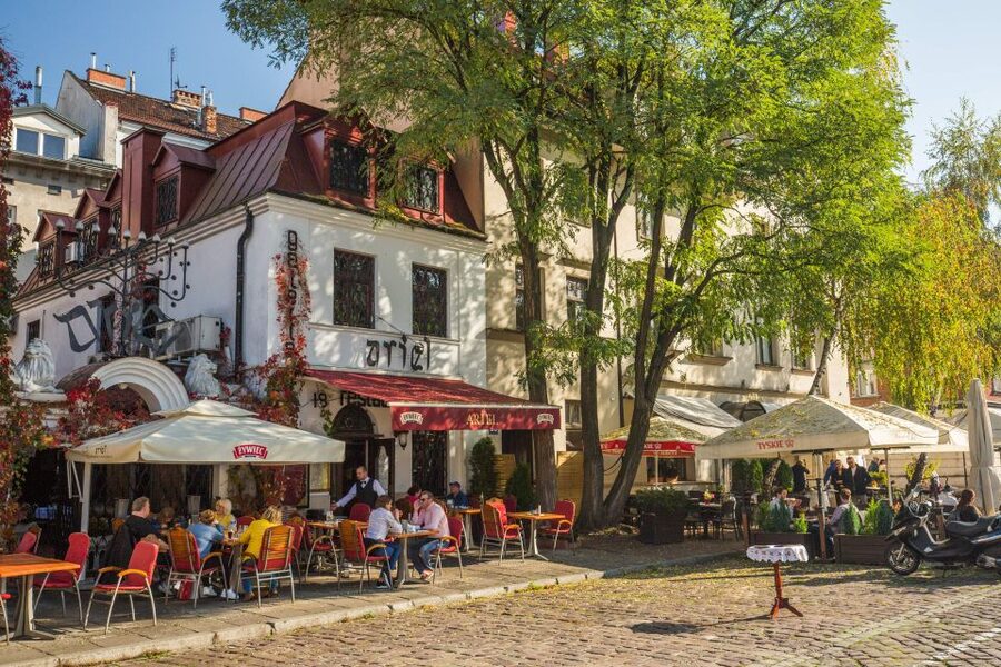 Krakow: Jewish Quarter Kazimierz & Schindler's Factory Tour - Kazimierz: from 14th-century settlement life to 19th-century change