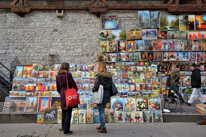Krakow Morning Walking Tour with Traditional Polish Breakfast - Wawel Royal Castle: calm courtyards and big panoramic views