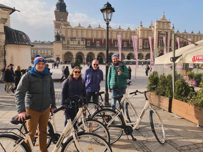 Krakow: Old Town and Kazimierz Guided Bike Tour - Wolnica Square and Plac Nowy, then the ride turns toward Kazimierz