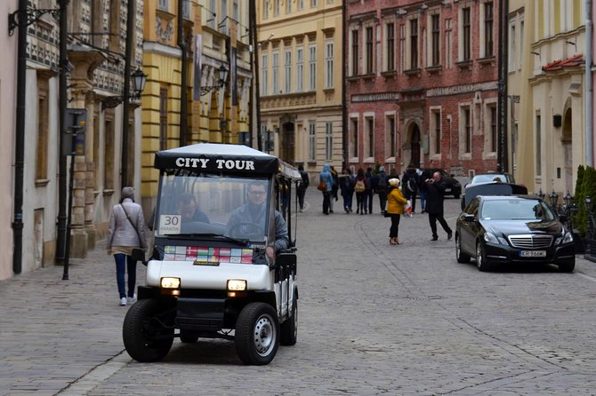 Krakow: Private Guided City Tour by Electric Car - WWII Ghetto Views: A Somber Stop Built Into the Loop