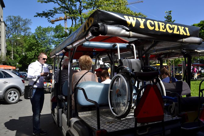 Krakow: Private Guided City Tour by Electric Car - The Electric Car Experience: Comfort, Weather, and Photo-Friendly Pace