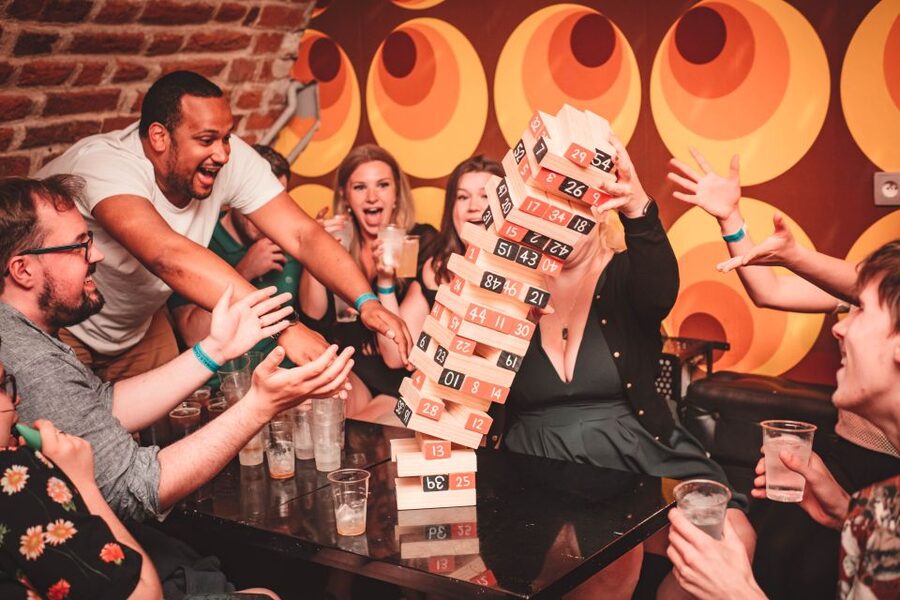 Krakow: Pub Crawl with 1 Hour of Unlimited Alcoholic Drinks - Drinking Games and Magic Show: How the Crowd Gets Going