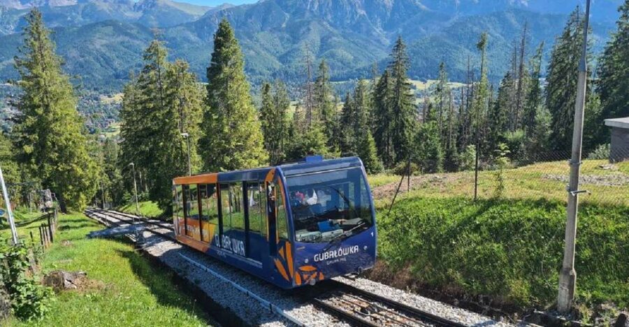 Krakow: Zakopane, Funicular, Cheese, and Highland Day Trip - Chochołów Wooden Highlander Village Stop