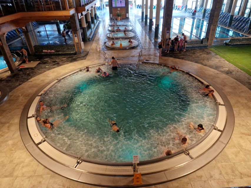 Kraków: Zakopane Tour, Thermal Pools & Hotel Pickup Options - Thermal pools in Zakopane: slides, jacuzzis, and crowd strategy