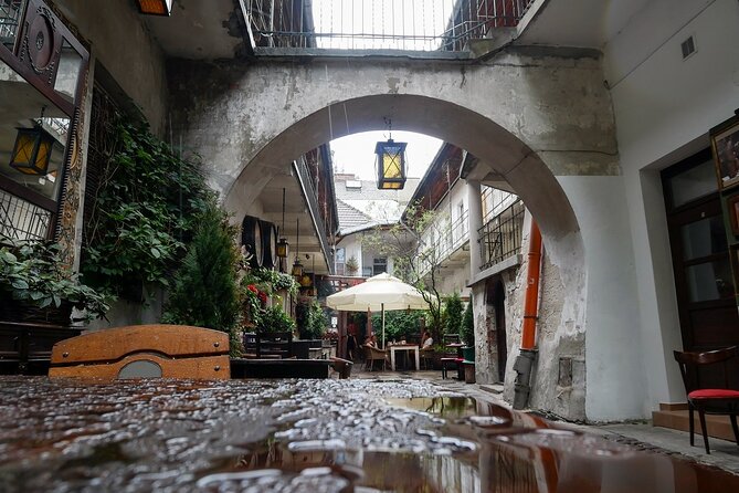Tour via Kazimierz Quarter by Golf Cart with Schindler's Museum in Krakow - The ghetto wall fragment and Umschlagplatz area: seeing the wartime geography